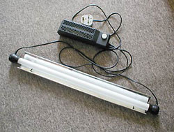 Fig.1 : A fluorescent tube set with a reflector